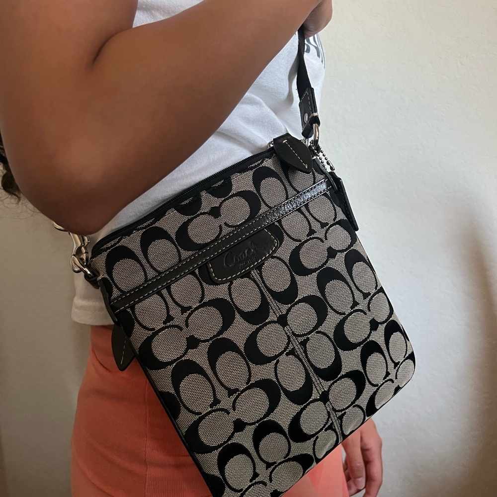 Coach crossbody. Black & silver hardware. Signature C logo, blue satin lining.